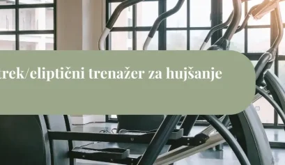 Orbitrek oziroma eliptični trenažer v fitnes prostoru, primeren za varno hujšanje, kardio vadbo in kurjenje kalorij brez obremenitve sklepov