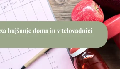 Vaje za hujšanje doma in v telovadnici: ročke, jabolko, steklenica napitka in planer treninga na mizi
